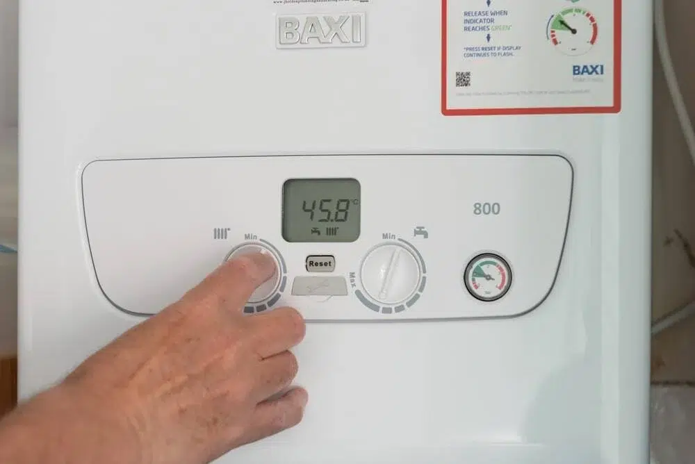 A Baxi boiler being inspected during a routine maintenance service.